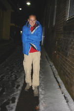 Ian shivers with a layer of frozen hail on the ground in Katoomba, Blue Mountains