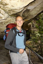 Ian under a rocky overhang, Grand Canyon, Blue Mountains