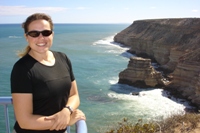 Nikki with view of Island Rock, Coastal section of Kalbarri National Park