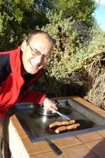Ian cooking up sausages on the barbie for breakfast, Hangover Bay, Nambung National Park