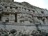 Detail of stucco frieze on west side of El Castillo, Xunantunich