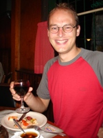 Ian enjoying wine & pizza in San Jose