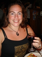 Nikki enjoying wine & pizza in San Jose