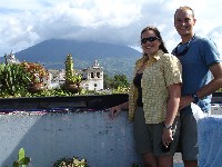 Nikki & Ian on the roof terrace at Cafe Sky with Volcan Agua in the backround, Antigua