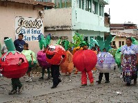 Children dressed as fruit and veg at church parade, San Pedro, Lago de Atitlan