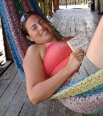 Nikki recovering in a hammock outside our room at Cross Creek Dive Centre