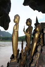 Buddha statues in the Lower Cave at Pak Ou Caves, near Luang Prabang
