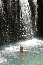 Ian in on eof the swimming pools at Kouang Si Waterfall, near Luang Prabang