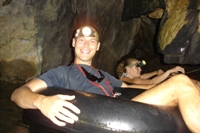 Ian in tube, Tham Nam Cave, Vang Vieng