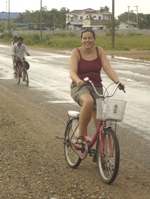 Nikki cycling back from the brewery, Vientiane