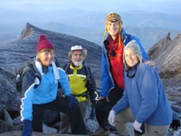 Us with Paul and Tinika at the summit of Mt Kinabalu, Sabah