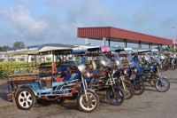 Row of tuk-tuks at Nong Khai Railway Station