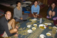 Ian, Toni, Amber and Sylvia sit down to dinner, Doi Chiang Dao Trek Day 
2