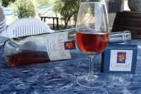 Rose wine bottle and glass at CarinaE