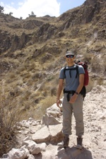 Ian manages a smile despite struggling on the hike down Colca Canyon