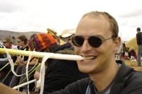 Ian enjoying munching on a totora reed, Uros floating islands
